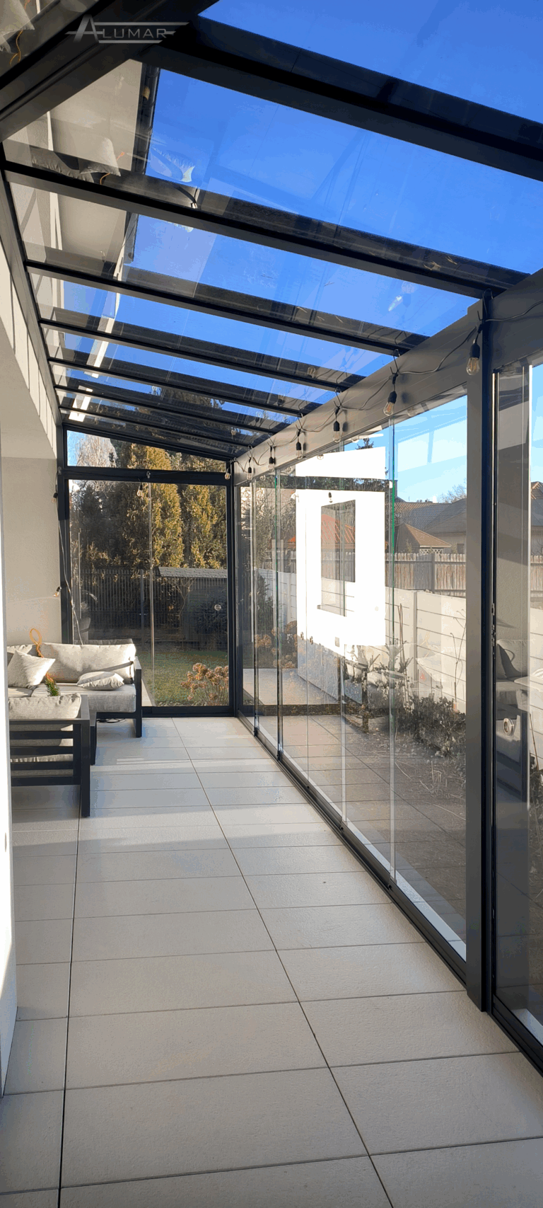 Szklane zadaszenia tarasów - dach tarasu zabudowany szkłem hartowanym - Realizacja Alumar-Zabudowy